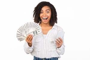 Happy girl with cash